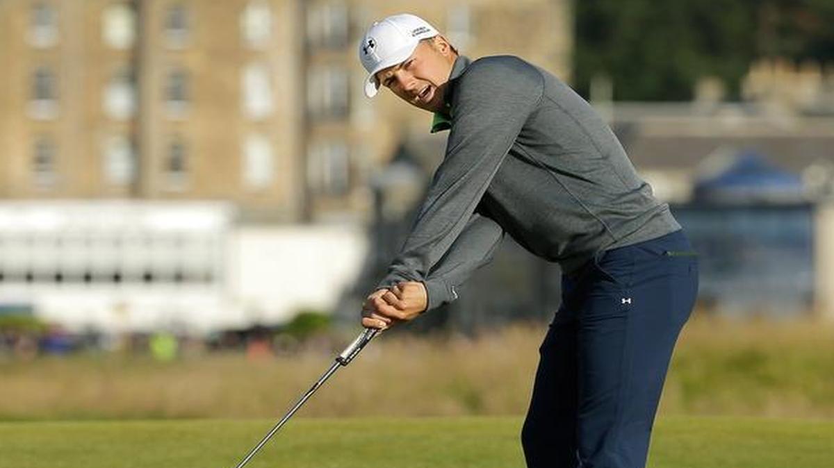 
Dallas’ Jordan Spieth putts on the 16th green during the second round of the British Open Golf Championship on Saturday. Spieth suffered through five three-putt greens at the Old Course at St. Andrews, Scotland
