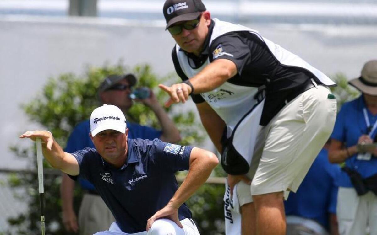 Ryan Palmer gets help lining up a putt from caddie James Edmonson during the final round at the Dean & Deluca Invitational on May 29. Palmer missed qualifying for the U.S. Open on Monday, but he still has a chance to qualify by cracking the top-60 in world rankings.
