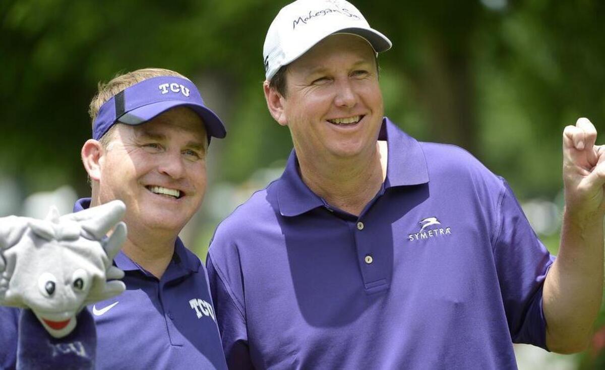 
J.J. Henry, right, posed for photos with TCU football coach Gary Patterson at the Colonial Pro Am.