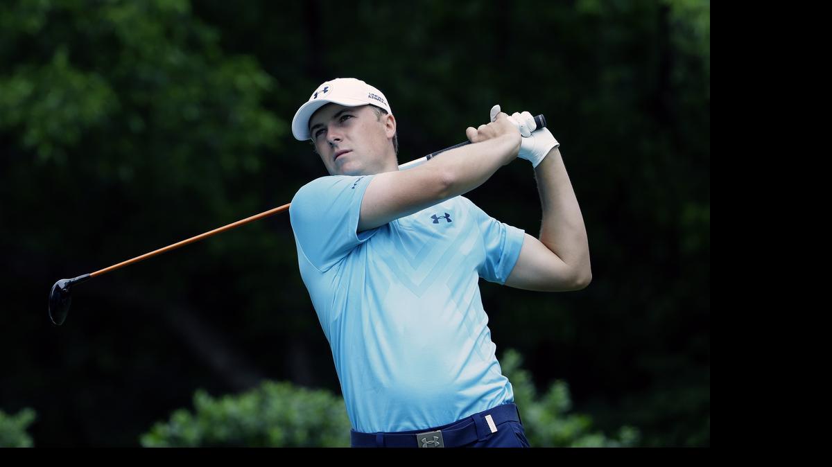 
Jordan Spieth watches his tee shot on the second hole during the first round of the Colonial golf tournament, Thursday, May 21, 2015, in Fort Worth, Texas. 
