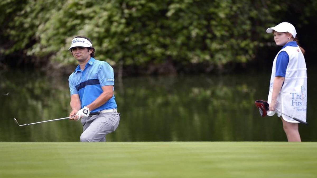 
Marget Lewis of Fort Worth caddies for PGA Tour pro and Fort Worth native Martin Flores.


