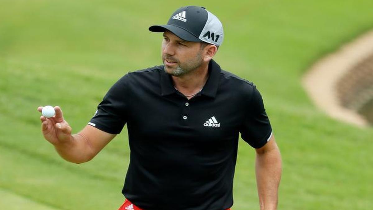 Masters champion and defending Byron Nelson champion Sergio Garcia acknowledges applause after sinking a putt for birdie on the 11th green. Garcia ended his round Saturday with six birdies over the final eight holes.