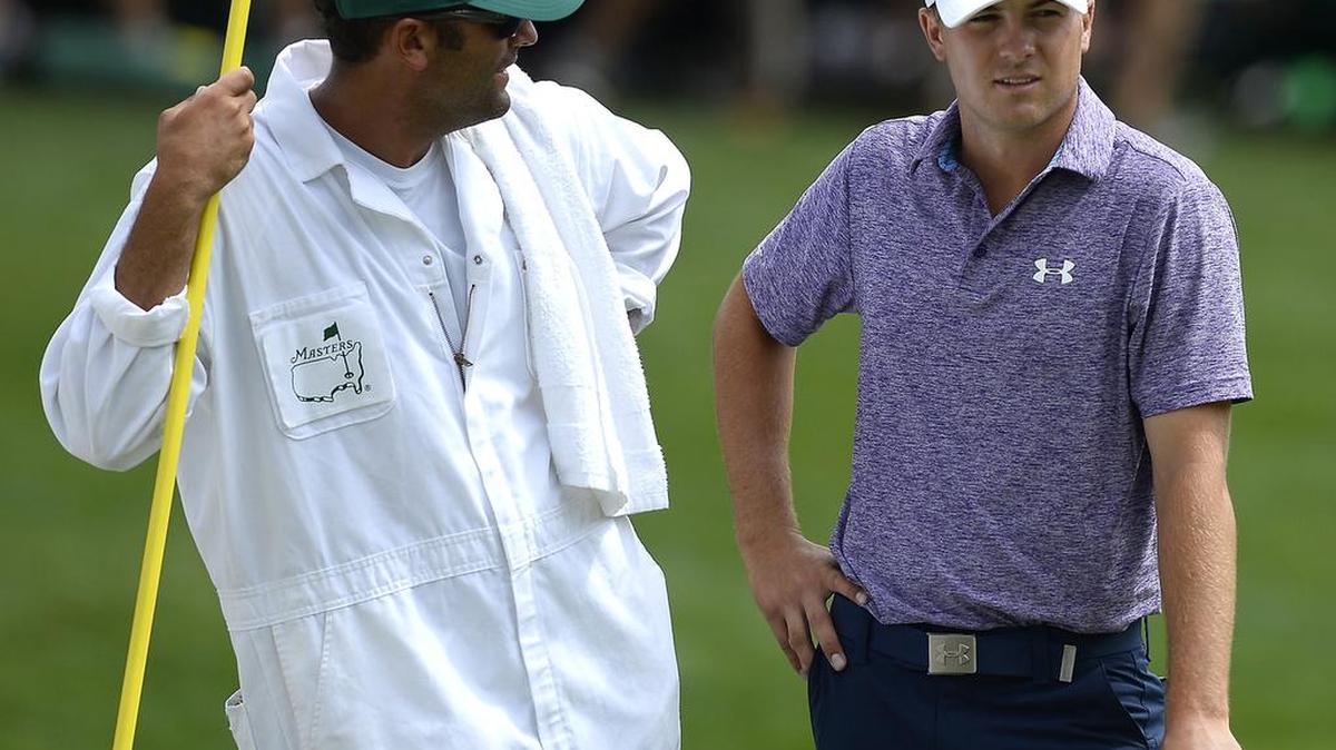Jordan Spieth and his caddie, Michael Greller, at the Masters in 2015.