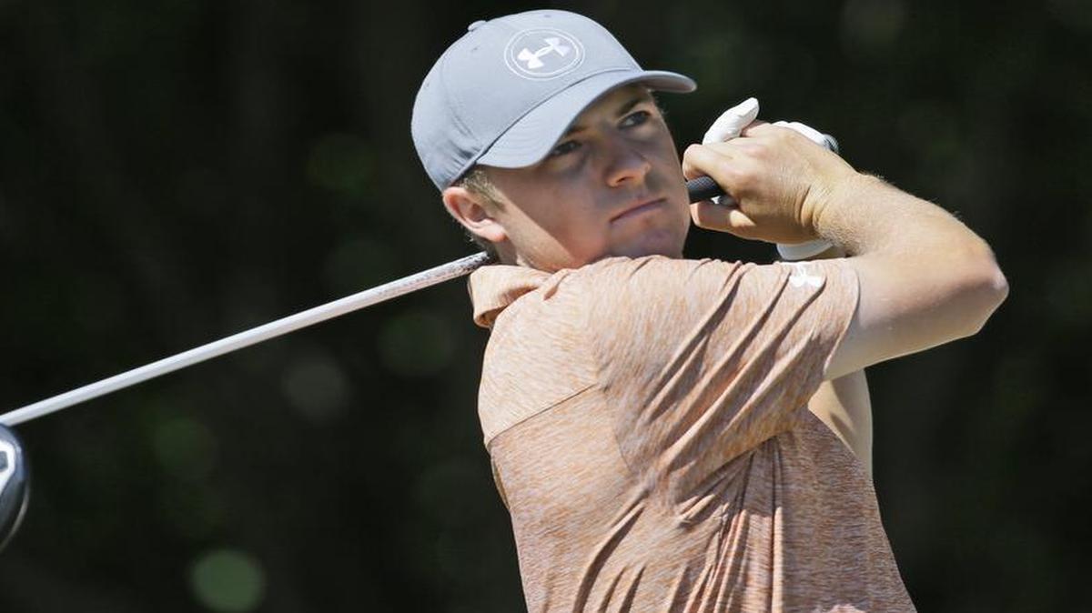 
Jordan Spieth watches his tee shot on the first hole during the final round of the Byron Nelson golf tournament, Sunday, May 31, 2015, in Irving, Texas. He shot even-par 69 and finished 11 shots behind the winner, Steven Bowditch. 
