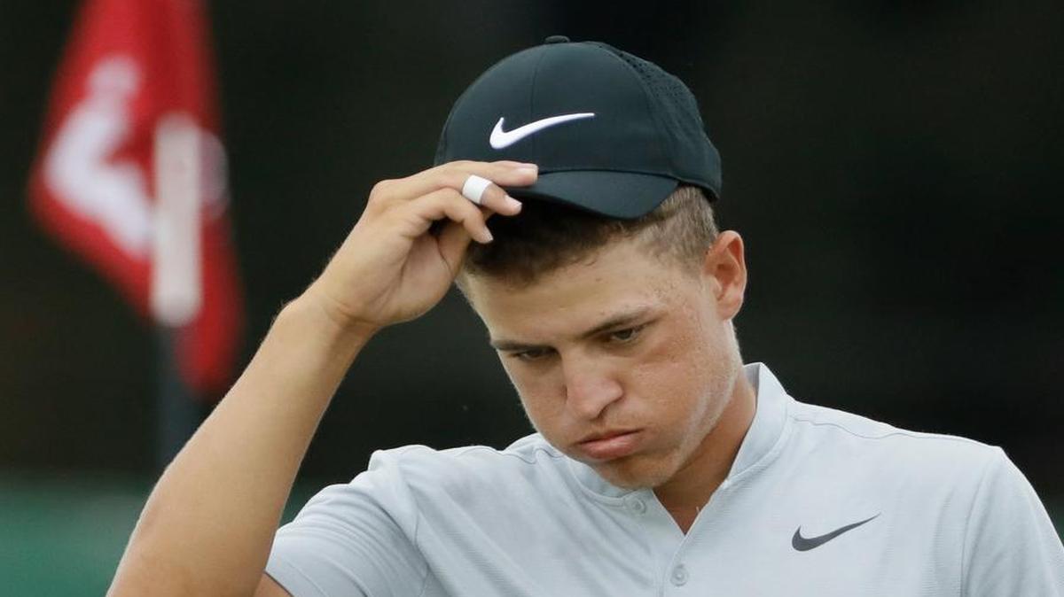 Cameron Champ reacts after finishing on the 18th hole during the third round of the U.S. Open golf tournament Saturday, June 17, 2017, at Erin Hills in Erin, Wis.