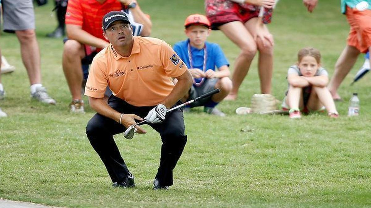 Colonial member Ryan Palmer watches his shot at the 18th hole during the first round of the Dean & DeLuca Invitational. Palmer was right at home on the course in the first round, shooting a 4-under 66 to move into a tie for fifth.