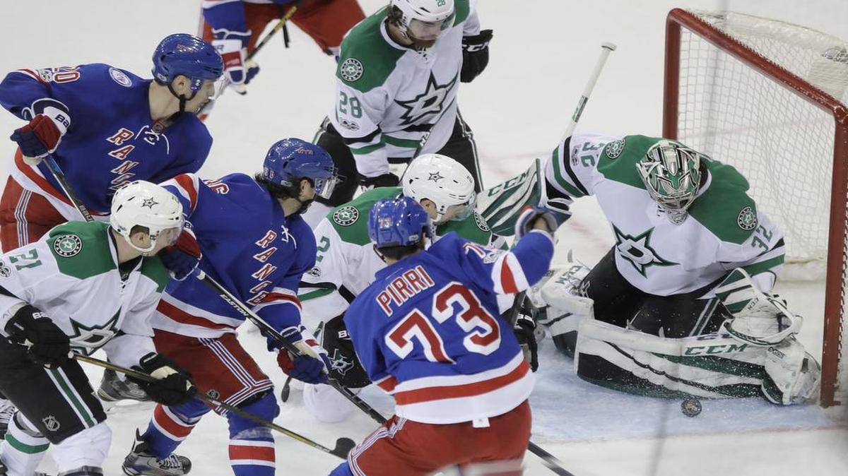 Dallas Stars goalie Kari Lehtonen makes a stop during the waning seconds of Tuesday’s wild 7-6 victory over the Rangers in New York. The Stars wrap up a three-game road trip Thursday in New York against the Islanders. The game will be televised at 6 p.m. on FSSW Plus.