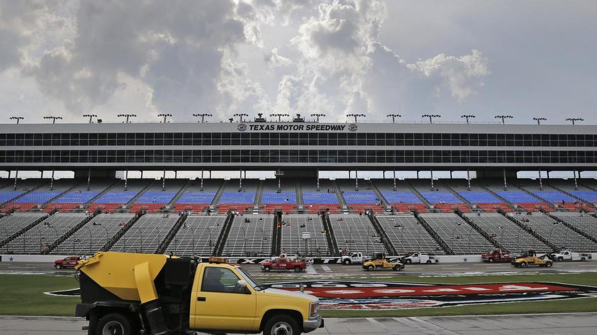 Trucks spent much of the day trying to dry the track at TMS before race officials postponed the Firestone 600 until Sunday at 1:15 p.m. The IndyCar event will be shown on NBCSN.