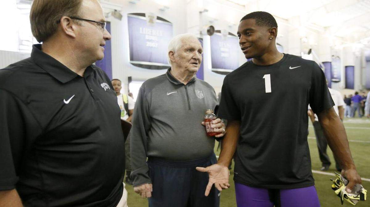 
Former TCU safety Chris Hackett, right, talks with coach Gary Patterson and NFL draft analyst Gil Brandt during the Horned Frogs’ Pro Day at TCU. Hackett is projected anywhere from a fifth- to a seventh-round pick in the draft.
