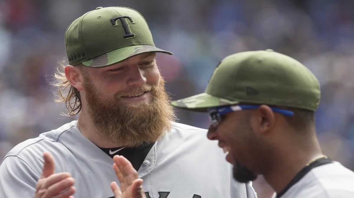Former TCU pitcher Andrew Cashner (2-5, 3.39 ERA), left, celebrating with shortstop Elvis Andrus, takes the mound for the Texas Rangers as they open a three-game interleague series Friday at the Washington Nationals. The game will be shown at 6 p.m. on Fox Sports Southwest.