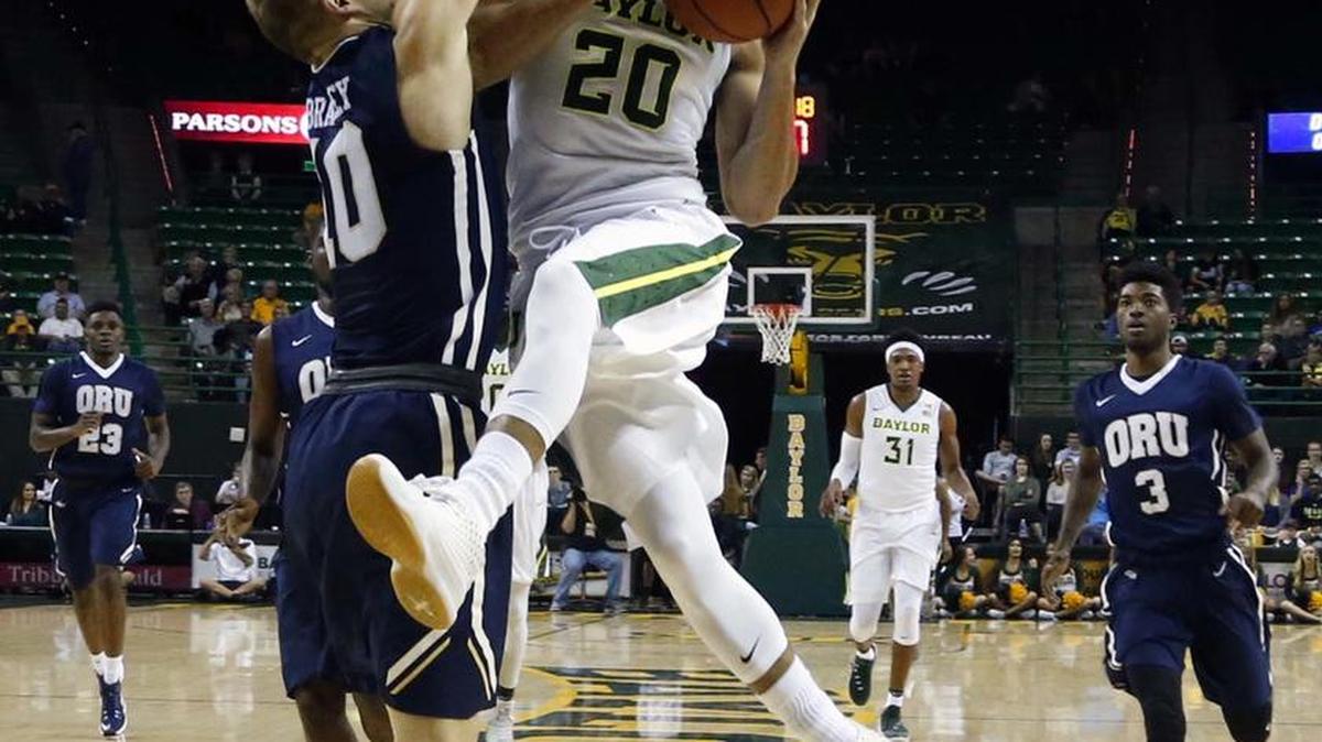 Baylor and guard Manu Lecomte, right, driving against Oral Roberts’ Jalen Bradley in Friday’s game, play host to Oregon on Tuesday. The telecast begins at 2:30 p.m. on ESPN2.