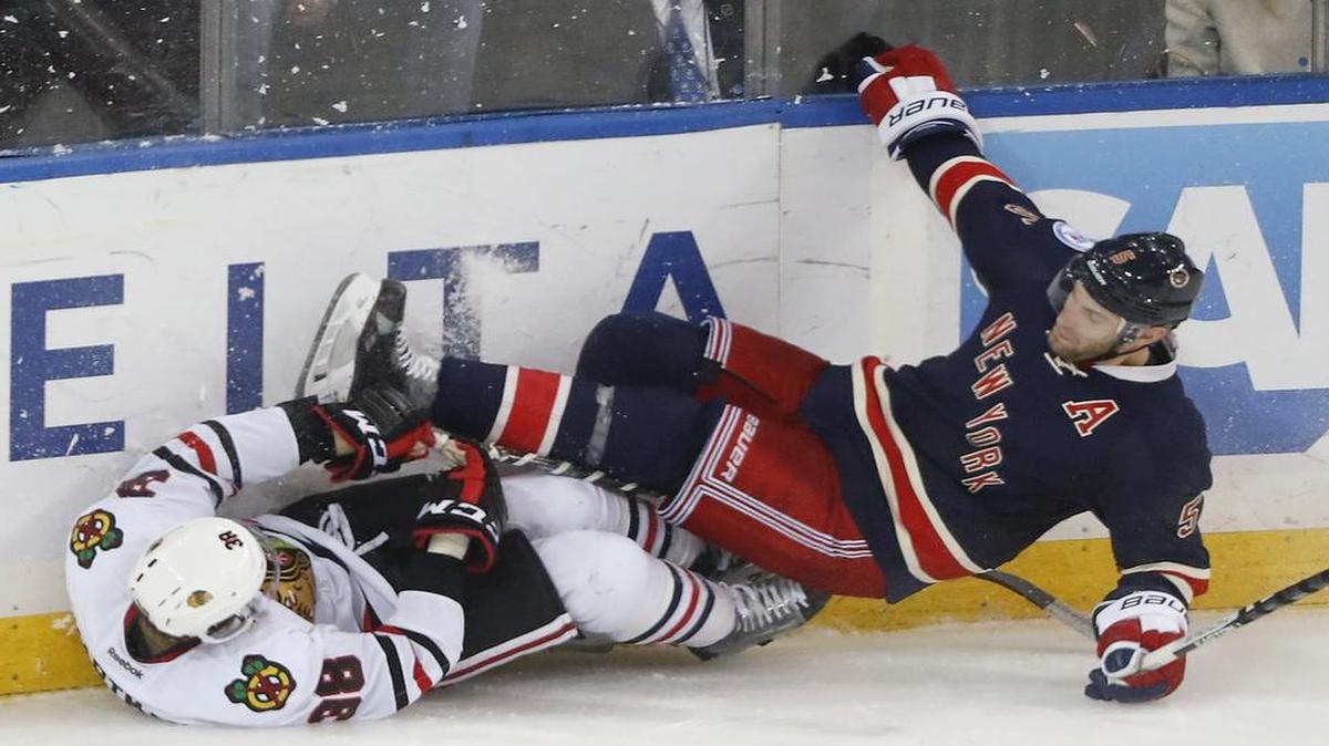 Defenseman Dan Girardi, right, and the New York Rangers were tripped up by wing Ryan Hartman and the Chicago Blackhawks 2-1 Tuesday. The Rangers next travel to Dallas to face the Stars, who continue their five-game homestand after winning the opener 6-2 over Anaheim on Tuesday. Thursday’s game is set for 7:30 p.m. on FSSW Plus.