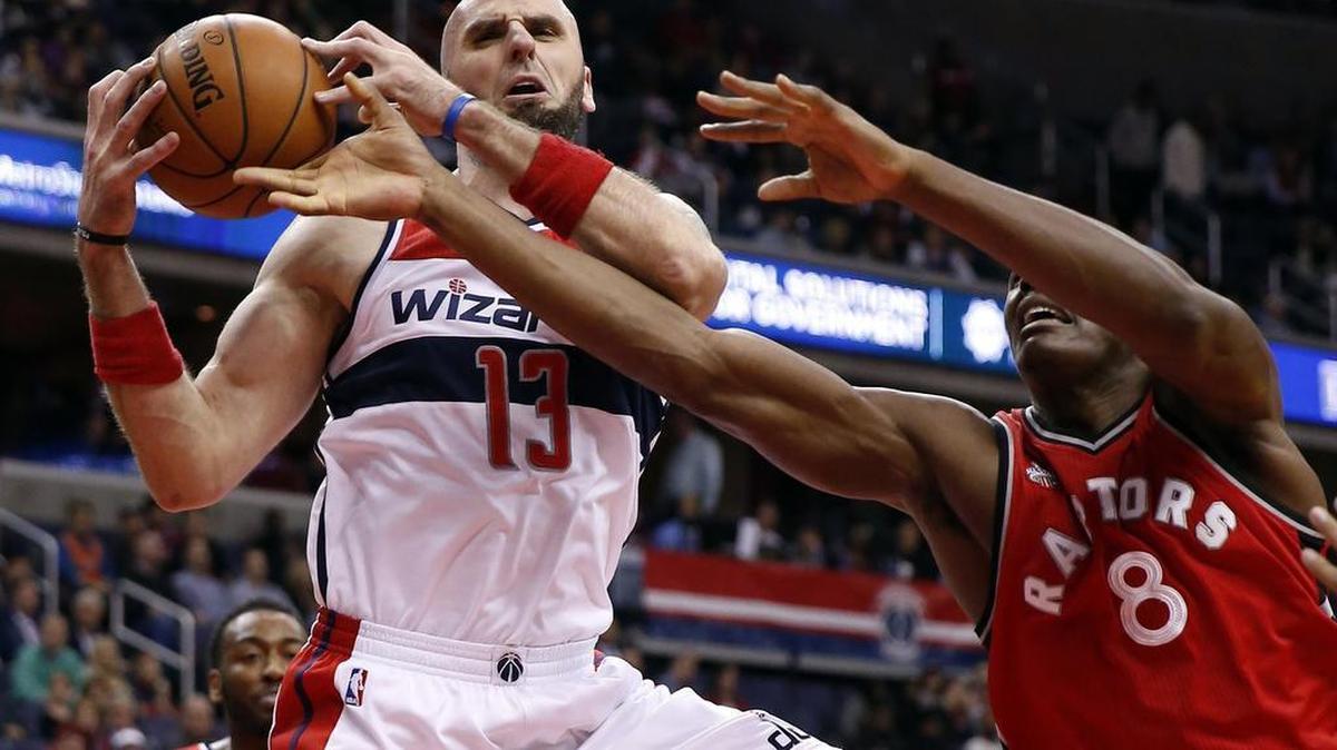 Marcin Gortat, left, did not play when the Wizards played the Mavericks last Sunday, will be available Saturday night.
