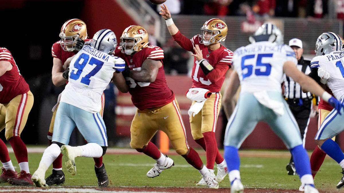 San Francisco 49ers quarterback Brock Purdy (13) passes against the Dallas Cowboys during the second half of an NFL divisional playoff football game in Santa Clara, Calif., Sunday.