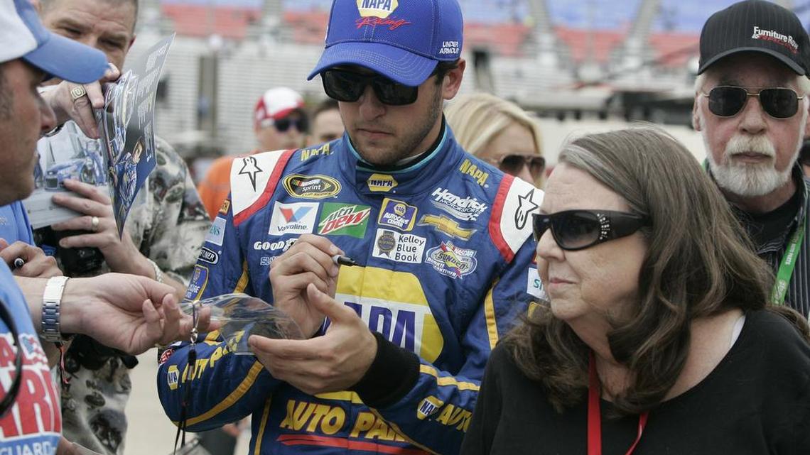 Chase Elliott is surrounded by fans seeking autographs at Texas Motor Speedway last week.