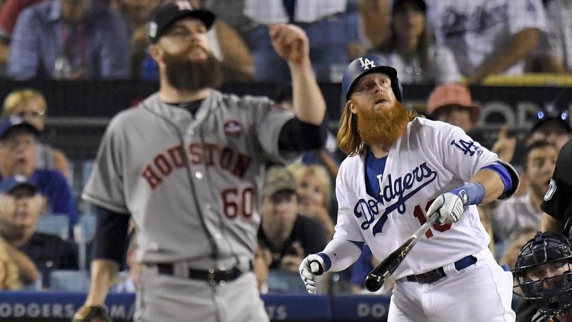 Los Angeles Dodgers’ Justin Turner watches his two-run home run off Houston Astros starting pitcher Dallas Keuchel during the sixth inning of Game 1 of the World Series Tuesday in Los Angeles.
