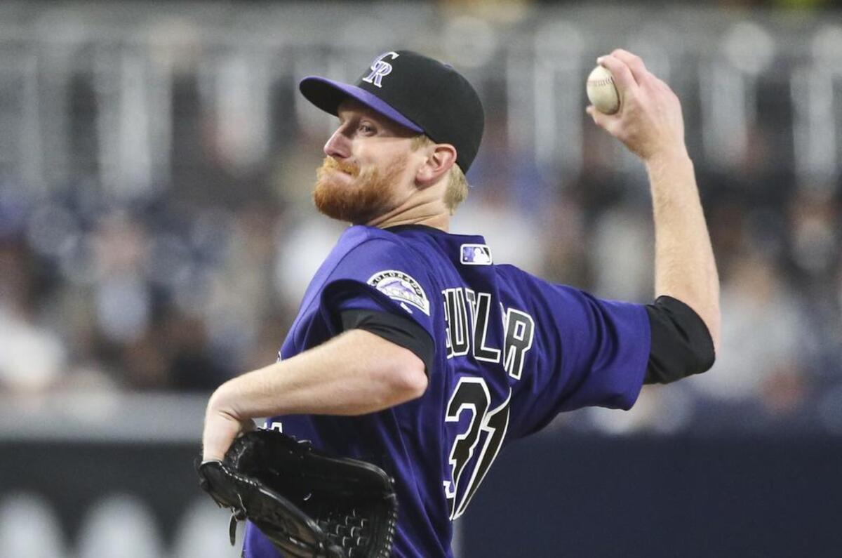 Rockies pitcher Eddie Butler sports a red-colored beard.