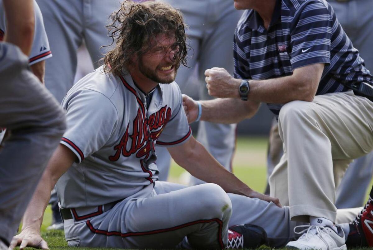 Braves pitcher Jason Grilli keeps a well-manicured beard. Combine that with the long hair and a moment of pain in 2015 and you suddenly have an Eddie Vedder lookalike.