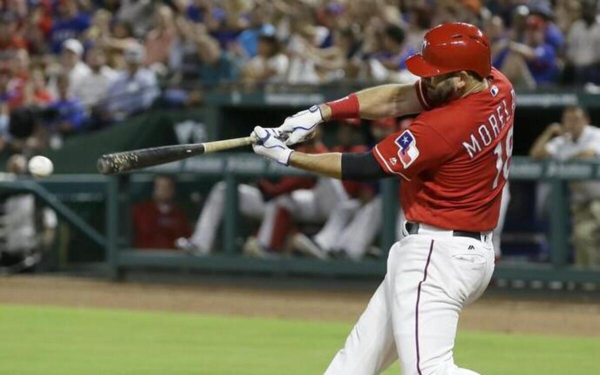 Texas Rangers first baseman Mitch Moreland says one thing about using a wood bat vs. a metal bat is that “if you hit one on the sweet spot, they both go.”