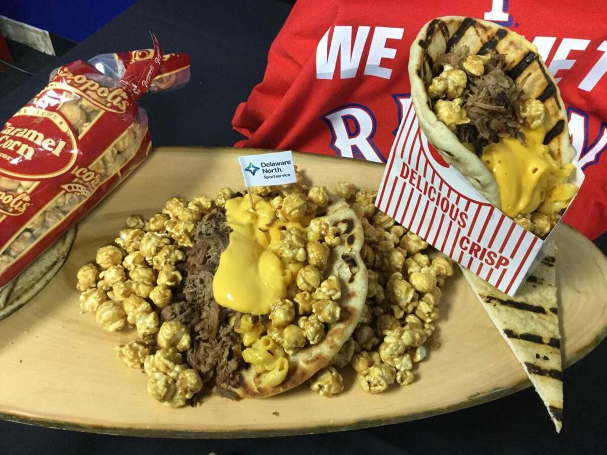 Smoked brisket and mac n cheese on pita Bread, topped off with Popcornopolis caramel popcorn makes up the Popcornopolis Pita.