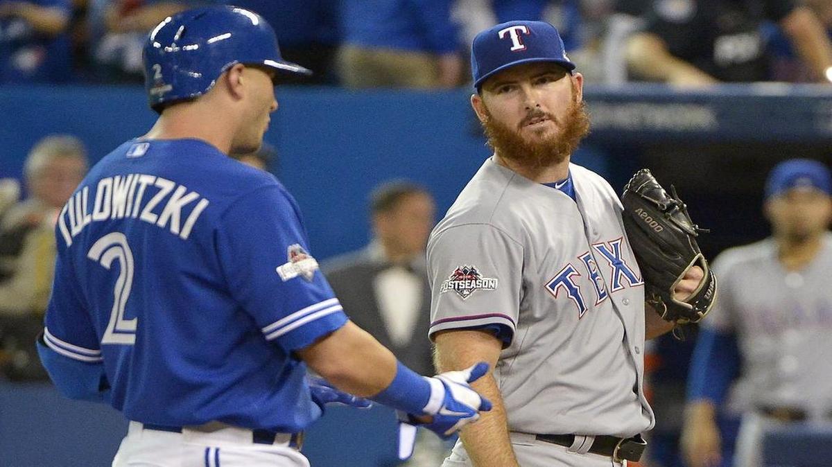 Rangers reliever Sam Dyson, right, had words with Blue Jays’ shortstop Troy Tulowitzki during ALDS Game 5 in October.