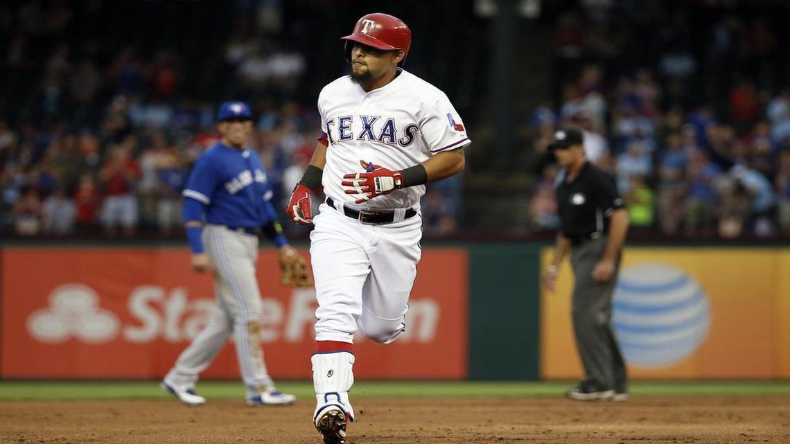 
Rangers’ second baseman Rougned Odor rounds the bases after hitting a solo home run off Blue Jays pitcher Mark Buehrle in the second inning Tuesday. He left the game with a fingernail injury in the sixth.
