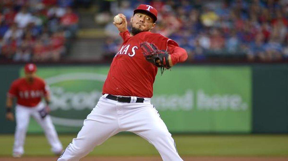 
Rangers pitcher Yovani Gallardo earned his first win for Texas after holding the Astros to two runs in 5-plus innings Saturday night. The Rangers won 6-2.
