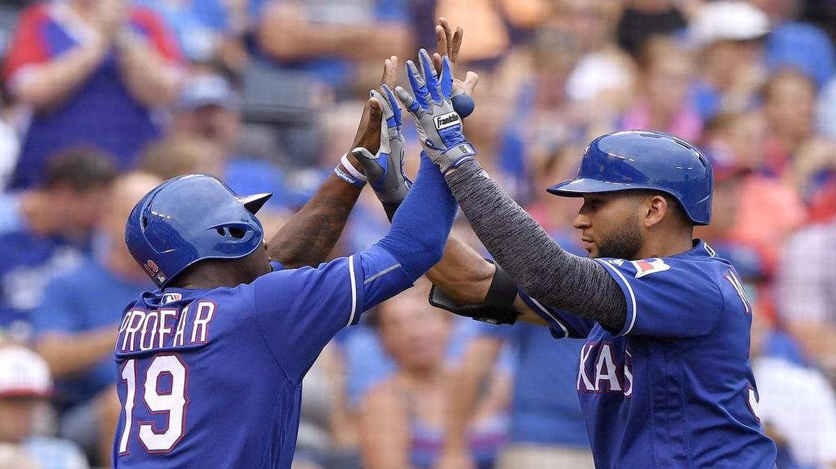 Nomar Mazara, right, is congratulated by Jurickson Profar after Mazara’s two-run homer in the fourth Saturday at Kauffman Stadium. The Rangers snapped a four-game losing streak with a 7-1 win.