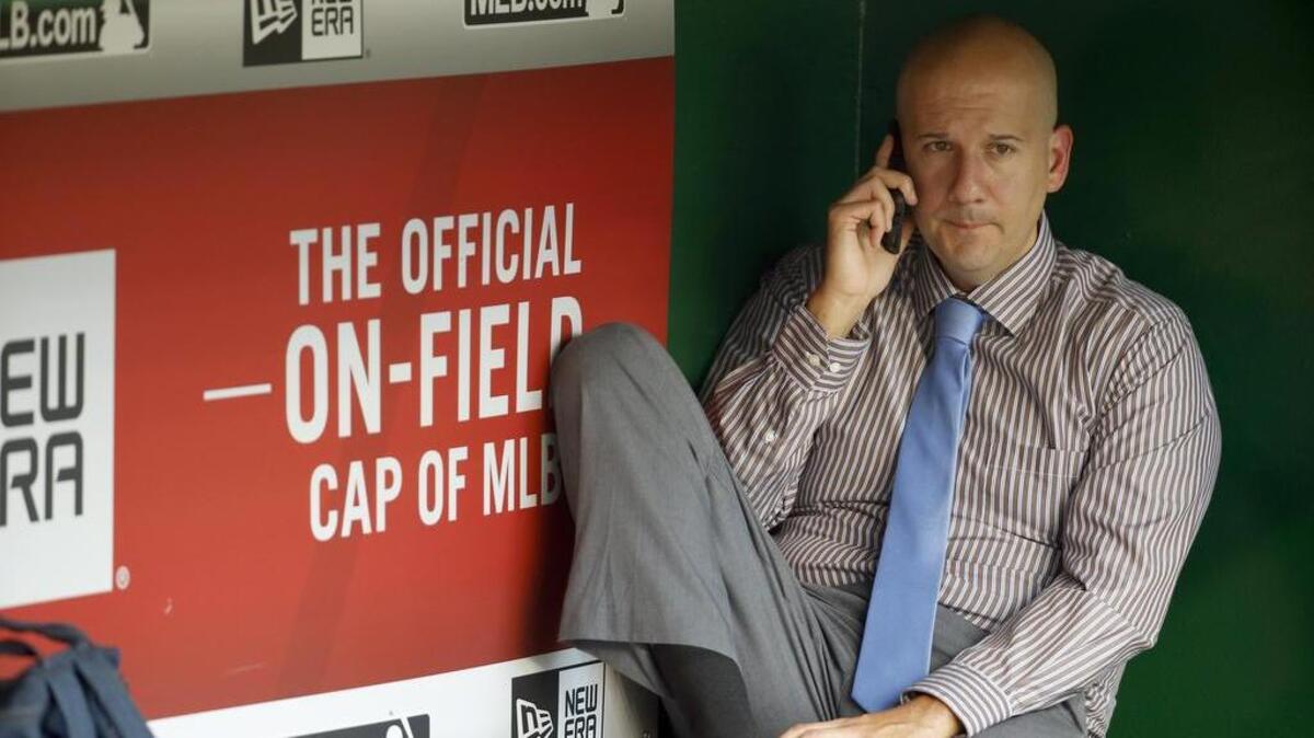 Former Atlanta Braves general manager John Coppolella was banned for life by MLB for rules violations in the international player market.
