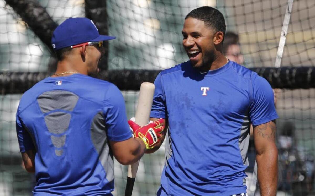 
Shortstop Elvis Andrus, right, and second baseman Rougned Odor will be even happier if the Rangers can sweep the Blue Jays.

