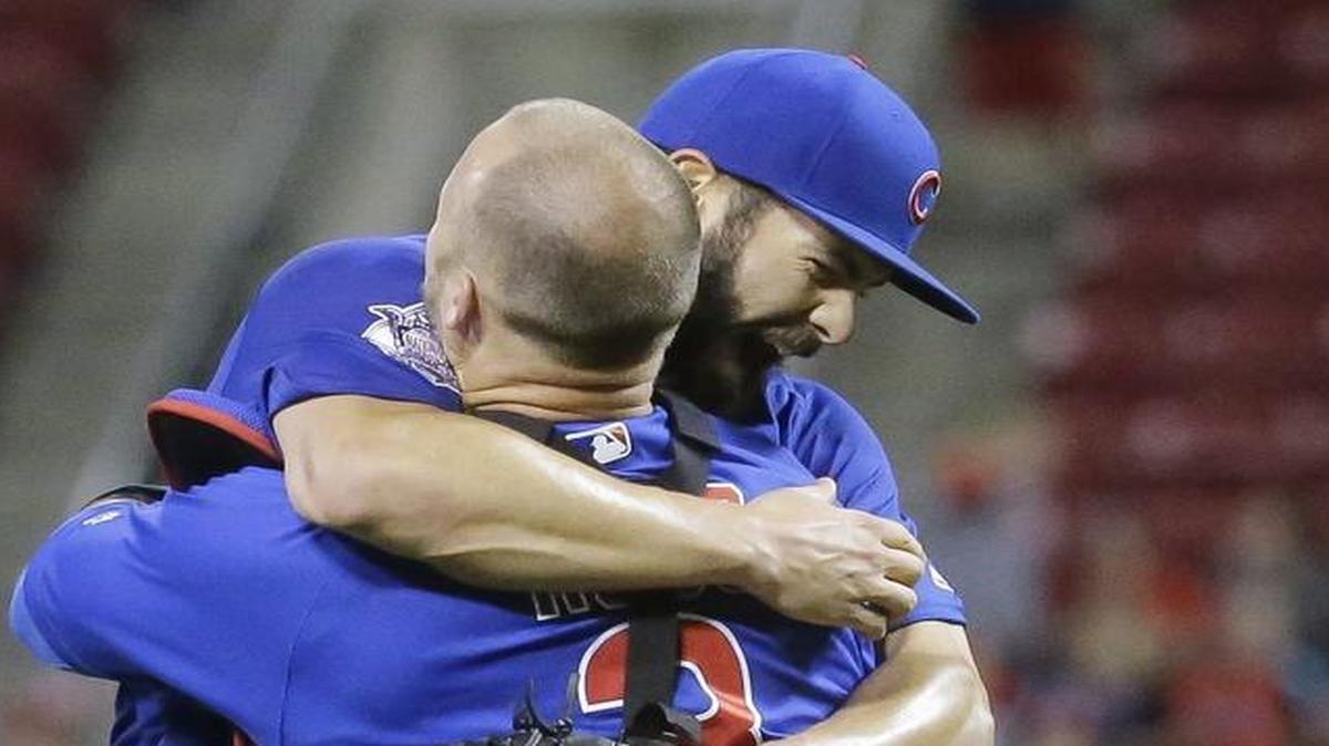 Chicago Cubs starting pitcher Jake Arrieta, left, celebrates with catcher David Ross after the final out of his no-hitter in a baseball game against the Cincinnati Reds on April 21.