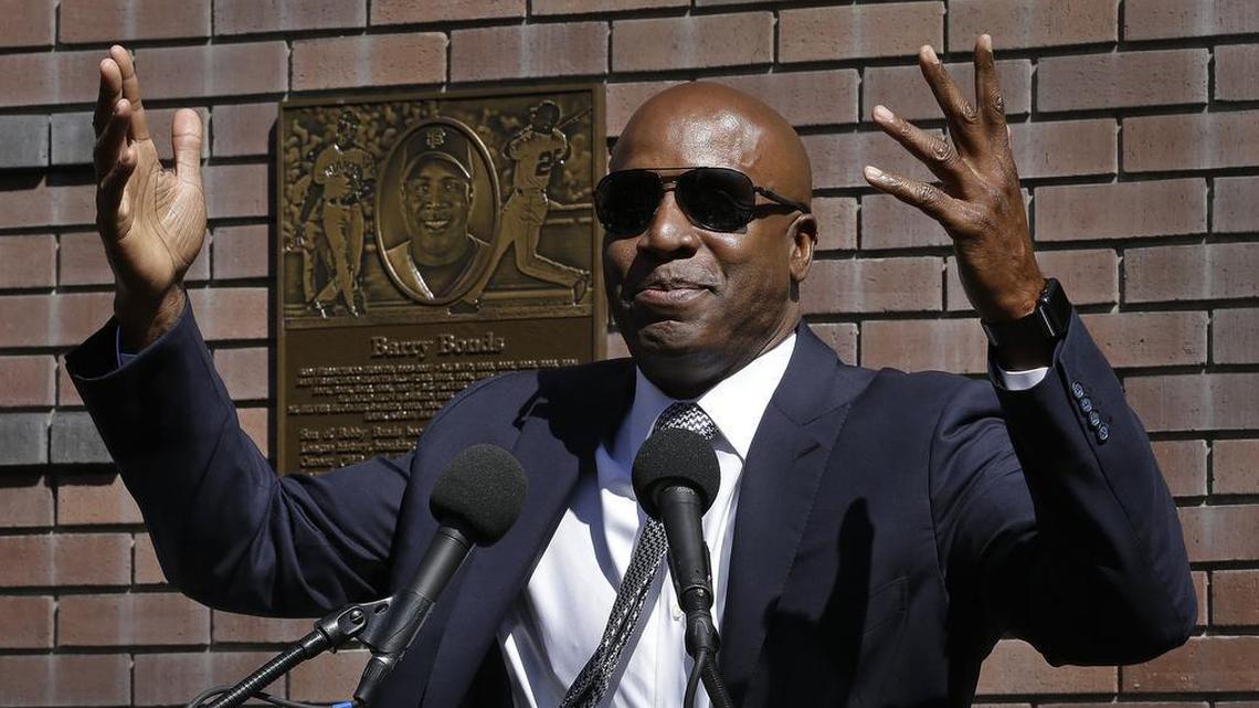 A lot voters feel like Barry Bonds in this photo, throwing their hands up when it comes to deciding if he belongs in the Hall of Fame.