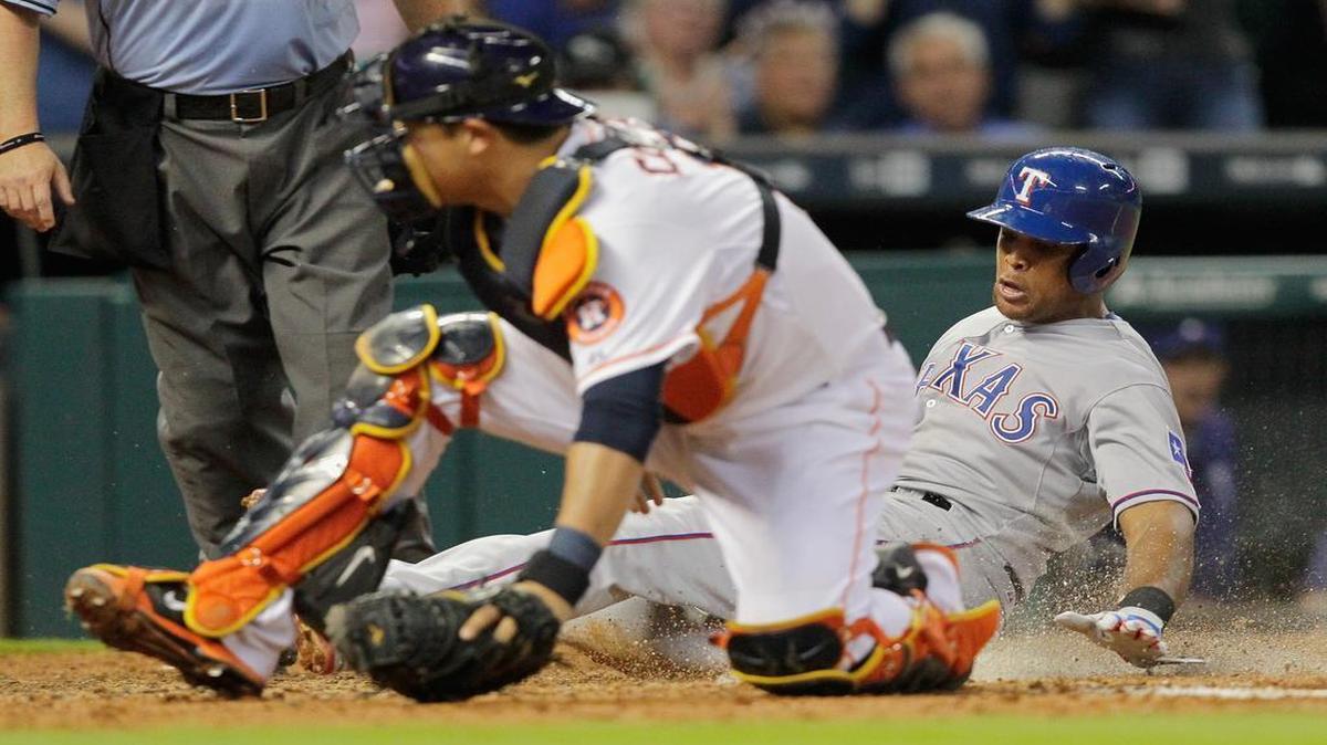 
Rangers’ third baseman Adrian Beltre scores the go-ahead run in the ninth to beat the Astros 2-1 on Monday night at Minute Maid Park. Beltre scored on a sacrifice fly to right field by Robinson Chirinos. The Rangers tied it with a run in the eighth.
