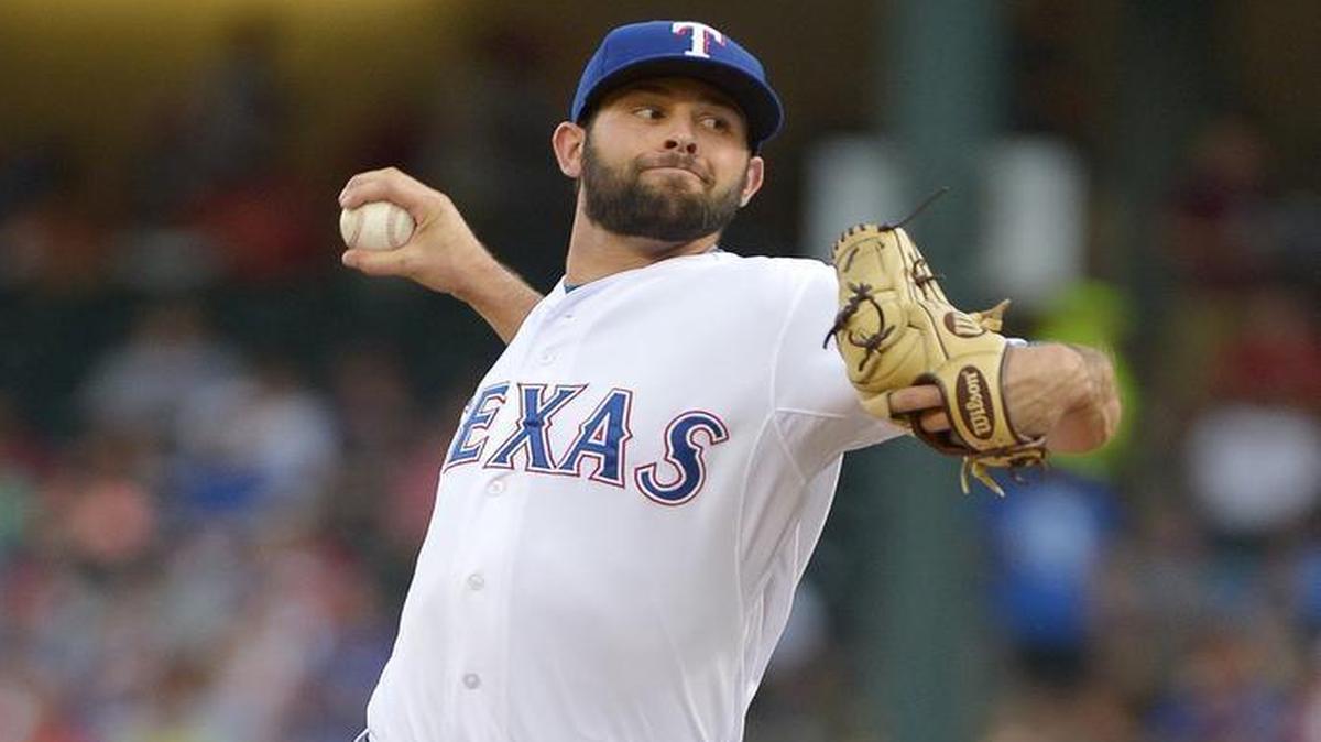 
Nick Martinez toiled through five innings in the heat while throwing 86 pitches but picked up the victory.


