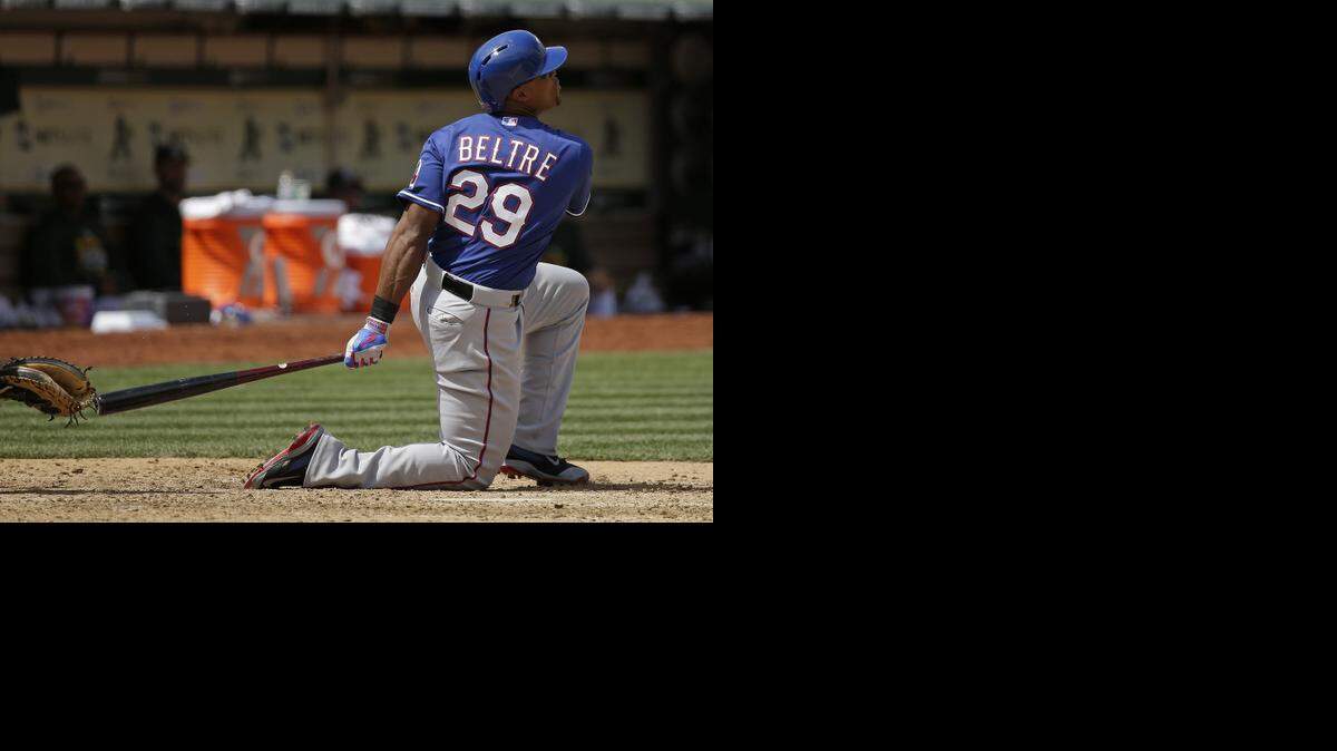 
Adrian Beltre dropped to a knee to knock career homer No. 396, one of four distance blows Thursday for the Rangers.
