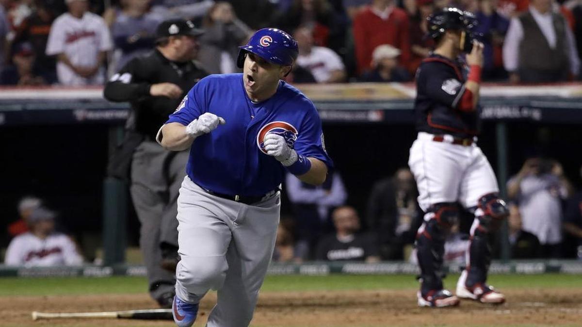The Cubs’ Miguel Montero hits an RBI single during the 10th inning of Game 7 of the Major League Baseball World Series against the Cleveland Indians Wednesday night in Cleveland.