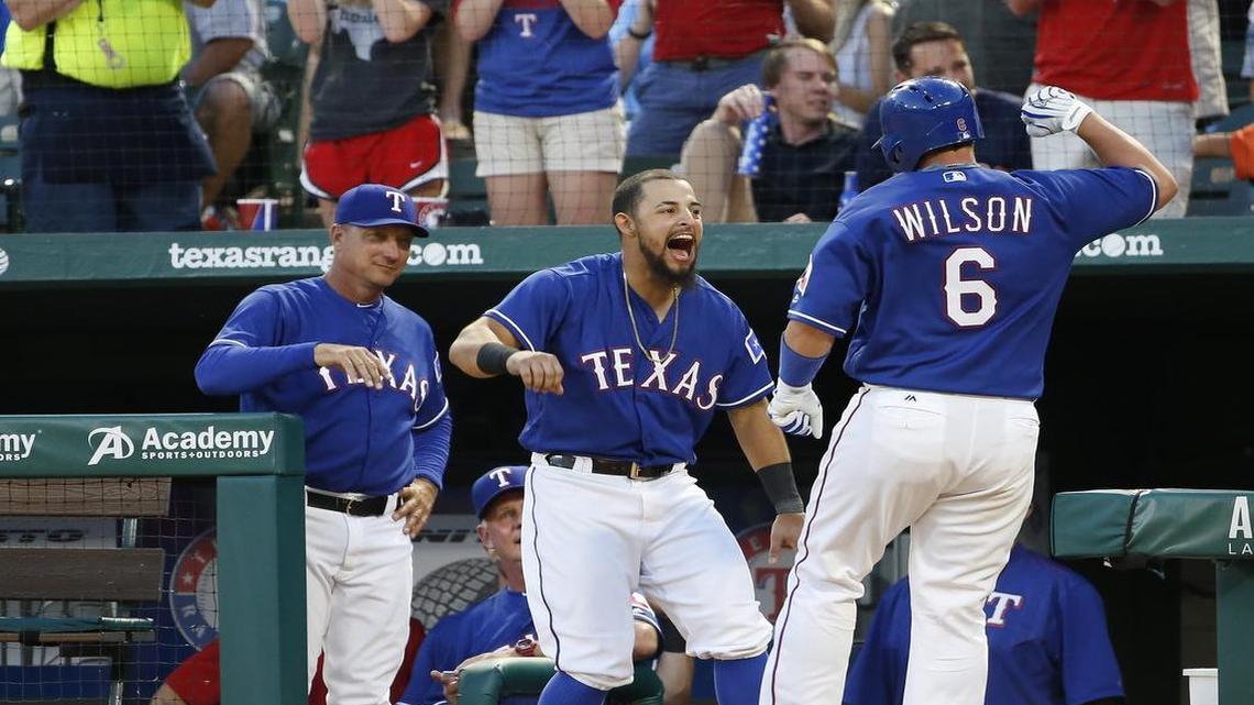 Bobby Wilson, right, is part of a four-man catching rotation that has given the Rangers some of the best production at the position in the league in addition to helping the rotation post the best ERA (3.39) in the league.