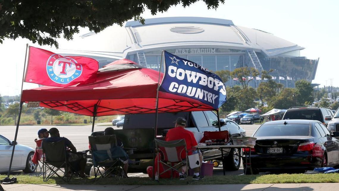 Rangers and Cowboys fans tailgate before a Rangers game in October 2015.