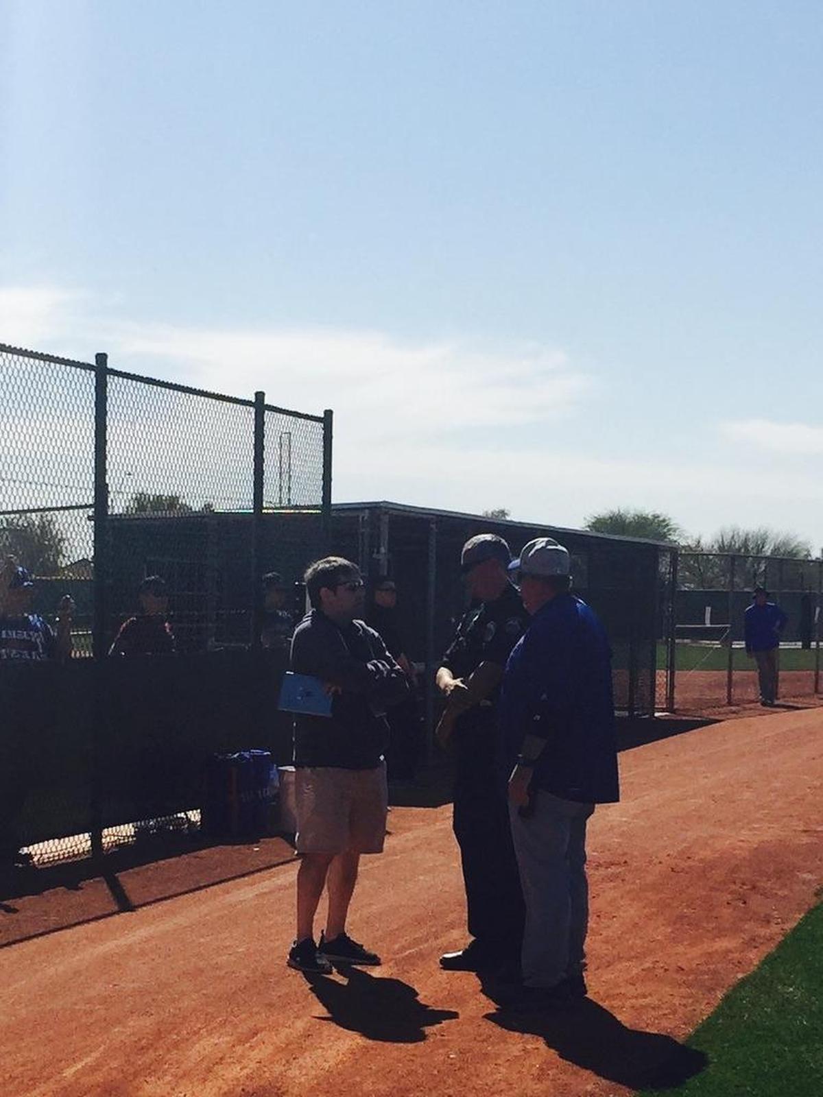 Here I am with Rangers’ security director Blake Miller and a member of the Surprise Police Department while they were “investigating” my stolen bottle of diet Pepsi Saturday morning in Surprise, Ariz.