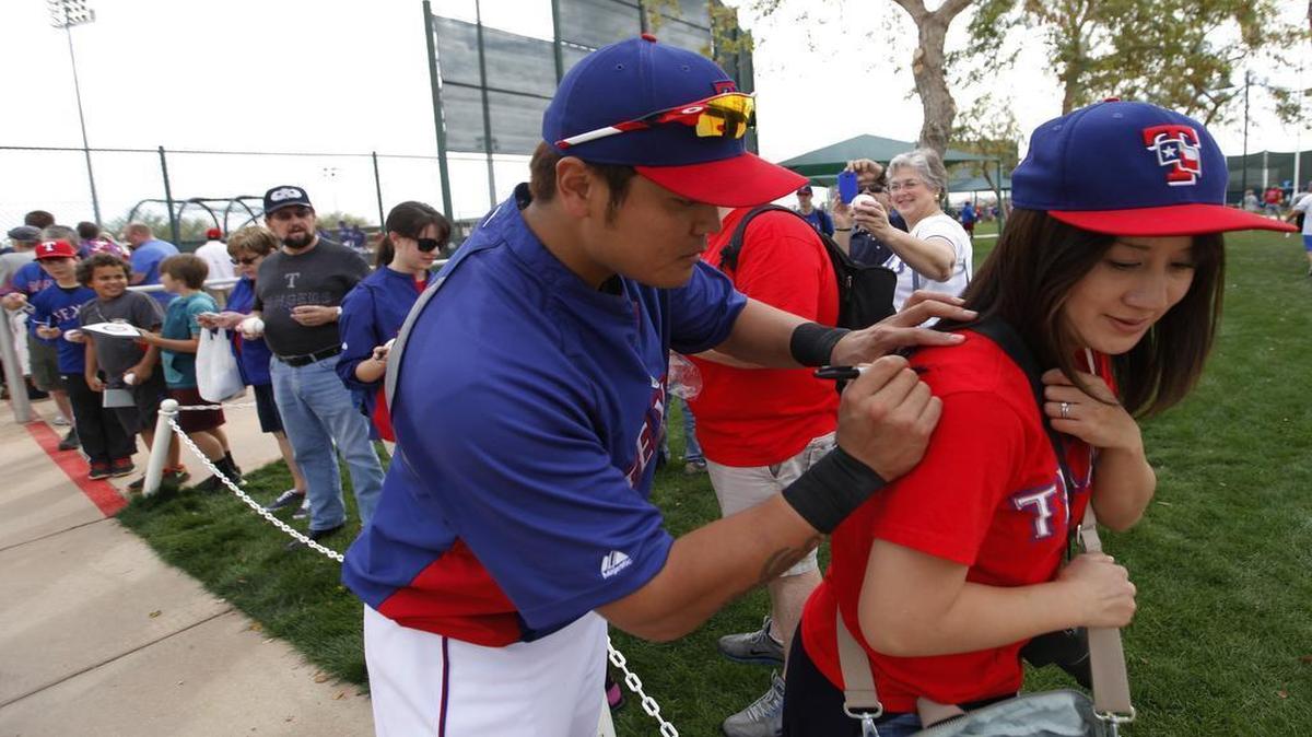 Spring training is a great chance for fans to get autographs from their favorite players, such as the Rangers’ Shin-Soo Choo.