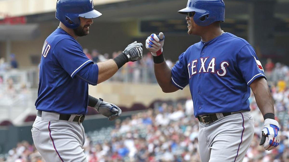 
Mitch Moreland, left, is congratulated by Adrian Beltre after his two-run home run  in the fourth. 

