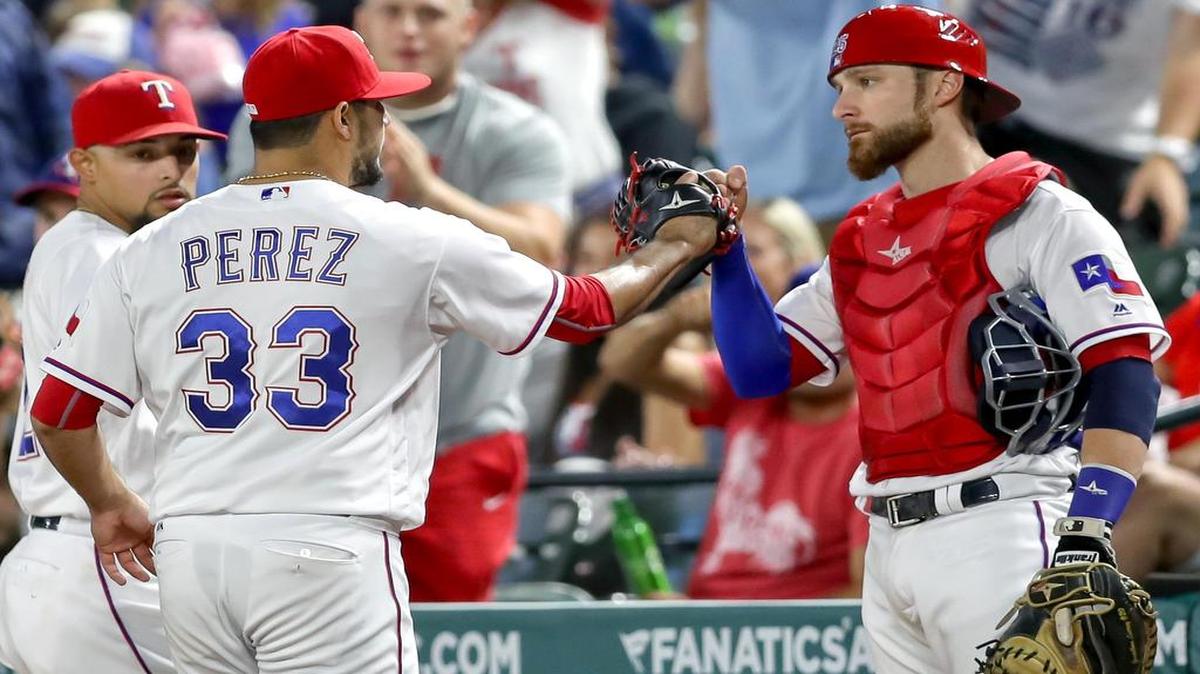 Martin Perez, left, will start Monday’s opener against the Milwaukee Brewers, the team that traded catcher Jonathan Lucroy to the Rangers on Aug. 1.