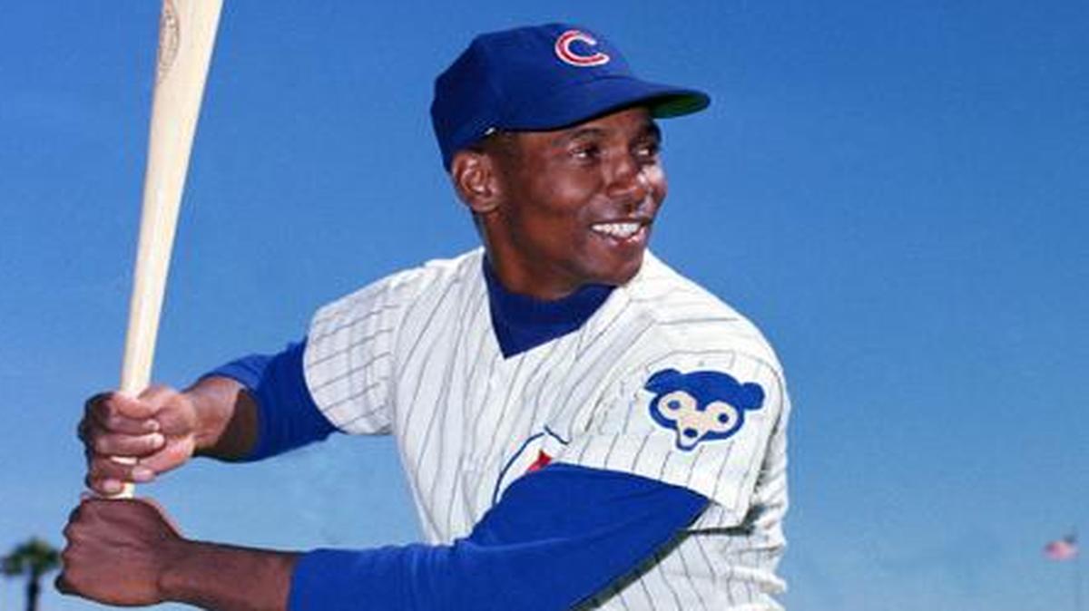 
 In this 1968 file photo, Chicago Cubs' Ernie Banks poses with a baseball bat. The Cubs announced Friday night, Jan. 23, 2015, that Banks had died. He was 83. 
