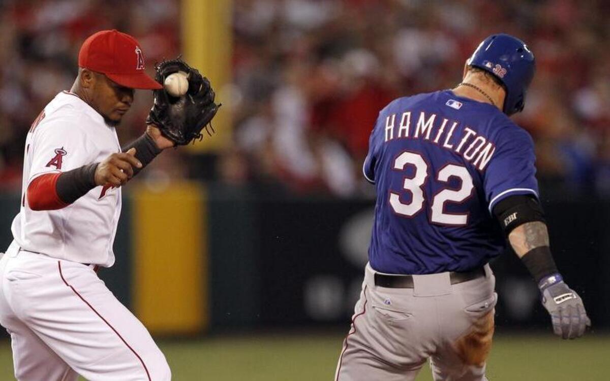 
Josh Hamilton had a busy night Friday on the bases and said that his left hamstring came through feeling better than it did earlier in the week.
