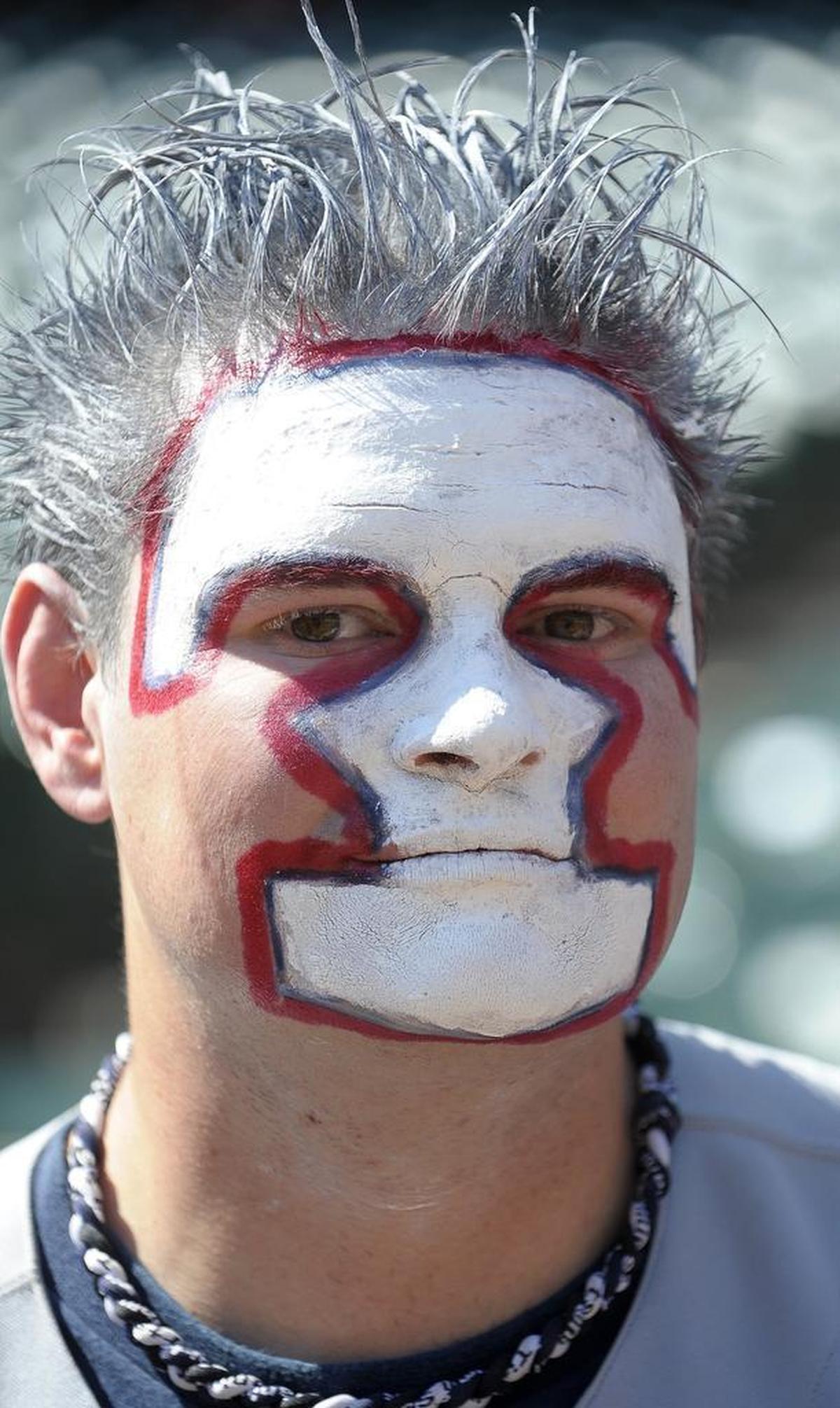 William De La Paza, 34, of Arlington, showed his Rangers spirit by painting his face with a big Texas T.