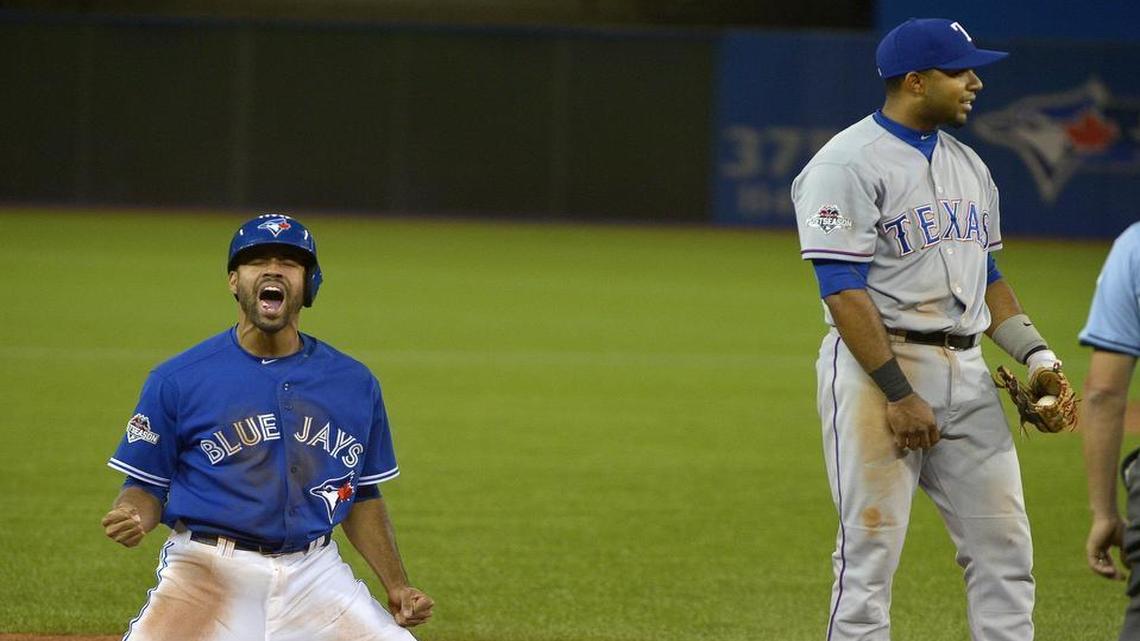 
Dalton Pompey was safe at third as Elvis Andrus committed his second error of the seventh inning, a frame that doomed the Rangers.
