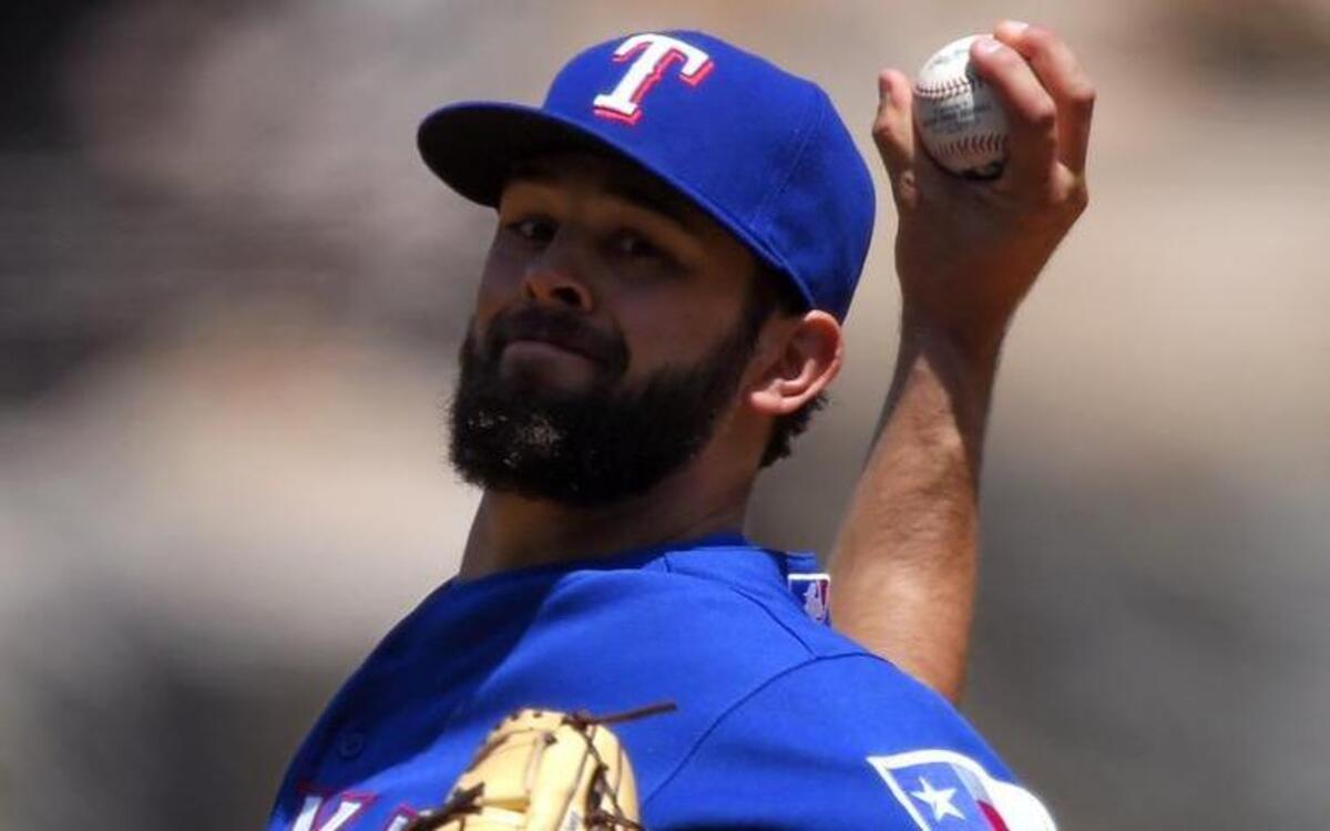 
Nick Martinez tossed six scoreless innings Sunday, but the Rangers’ bullpen couldn’t hold the lead. The Rangers, though, won in extra innings.
