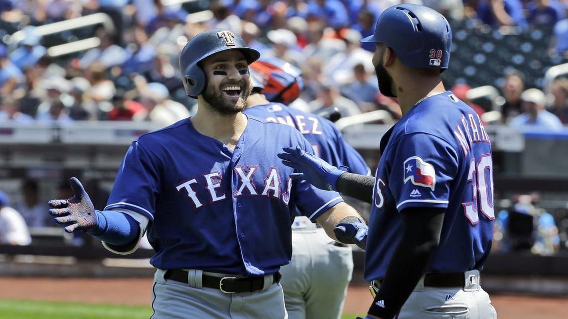 Joey Gallo, left, celebrates his two-run home run with Nomar Mazara in the first inning Wednesday afternoon against the Mets at Citi Field.