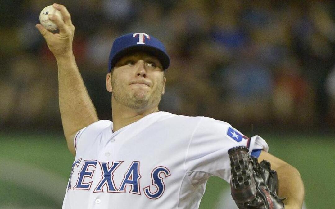 
Closer Shawn Tolleson pitched the bottom of the 11th inning Saturday with the Rangers holding an 11-3 lead.

