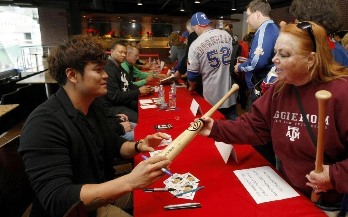 Shin-Soo Choo is one of the many Texas Rangers players who are scheduled to sign autographs between 4 and 7 p.m. Tuesday during the club’s Cowboy Santas toy drive at Globe Life Ballpark in Arlington.